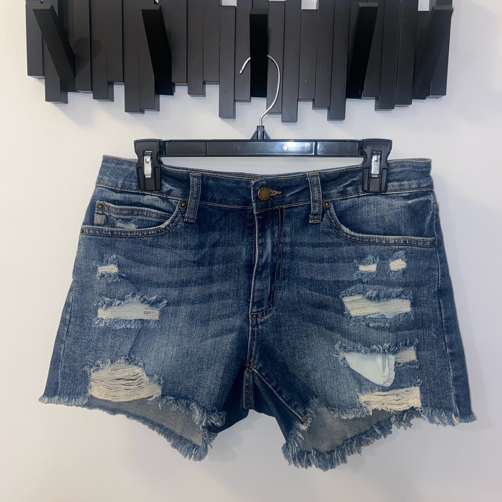 Just USA ripped jean shorts size L. Mid rise.